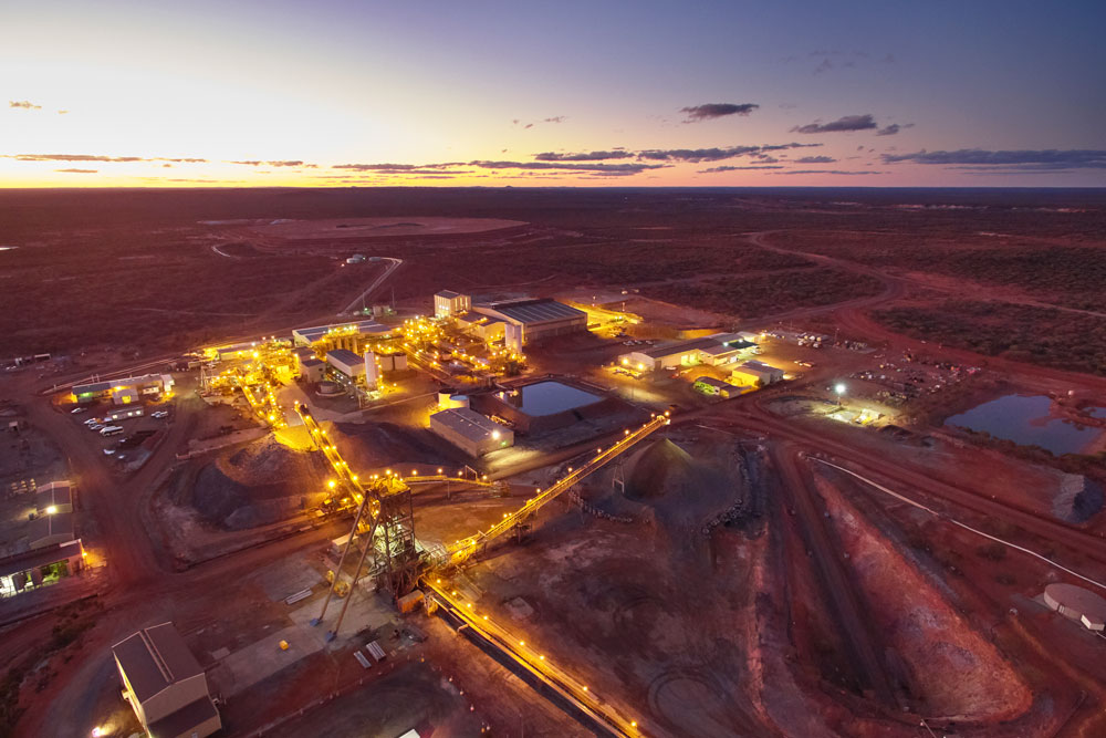 Aerial view of Golden Grove site lit up at sunset
